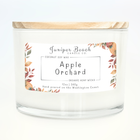 Apple Orchard 12 oz candle in a white glass jar with a natural pine lid