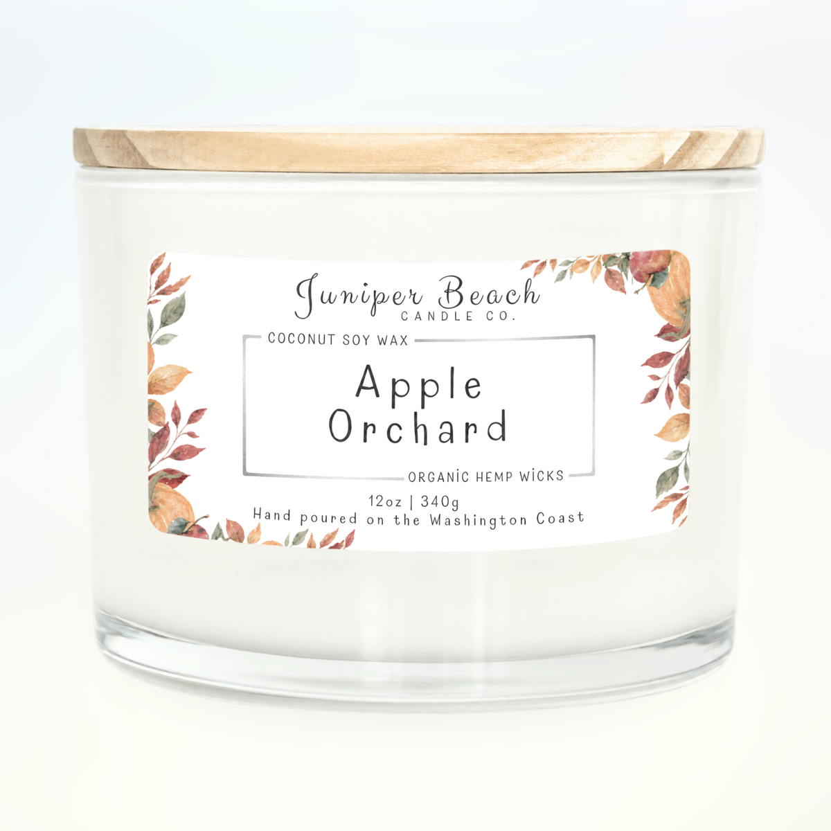 Apple Orchard 12 oz candle in a white glass jar with a natural pine lid