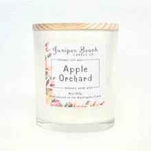Apple Orchard 8 oz candle in a white glass jar with a natural pine lid