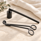 Black candle care kit with wick trimmer and candle snuffer