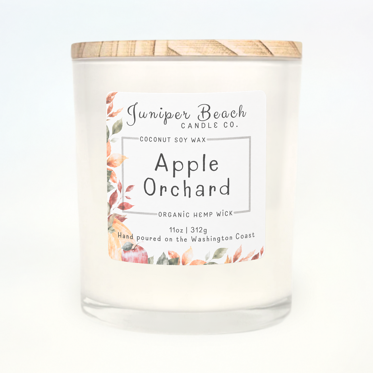 Apple Orchard 11 oz candle in a white glass jar with a natural pine lid
