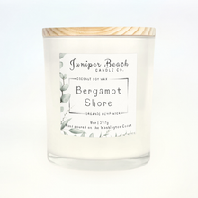 Bergamot Shore 8 oz candle in a white glass jar with a natural pine lid