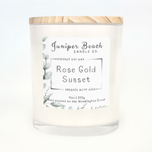Rose Gold Sunset 11 oz candle in a white glass jar with a natural pine lid