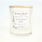 Salt Water Mist 8 oz candle in a white glass jar with a natural pine lid